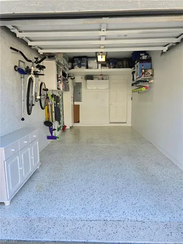 Garage featuring electric panel