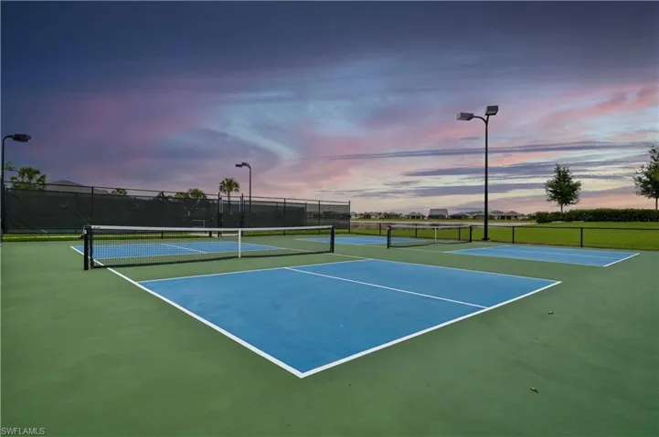 View of sport court with community basketball court and fence