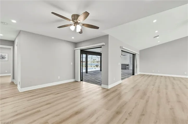 Unfurnished living room with recessed lighting, a ceiling fan, and light wood-style floors