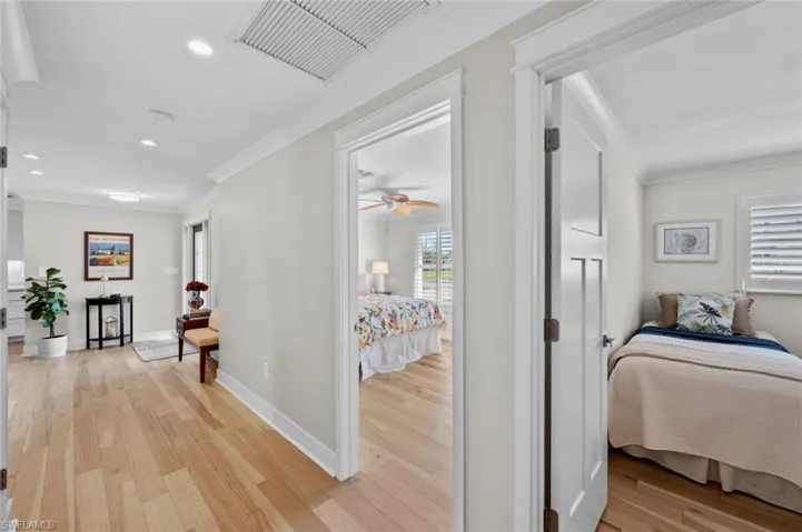 Hall from front entry leads to guest bedrooms