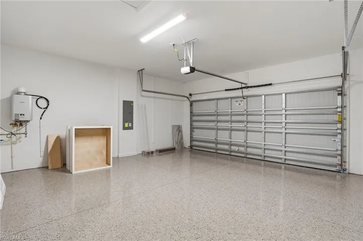 Garage featuring electric panel