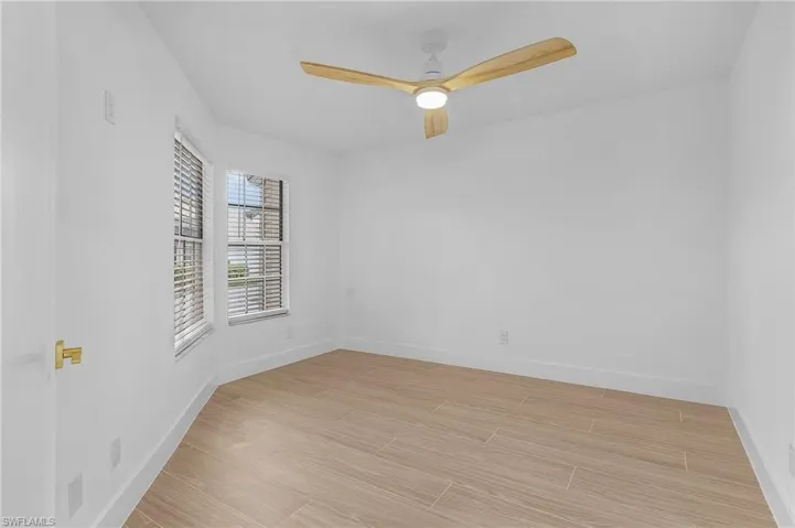 Spare room featuring ceiling fan