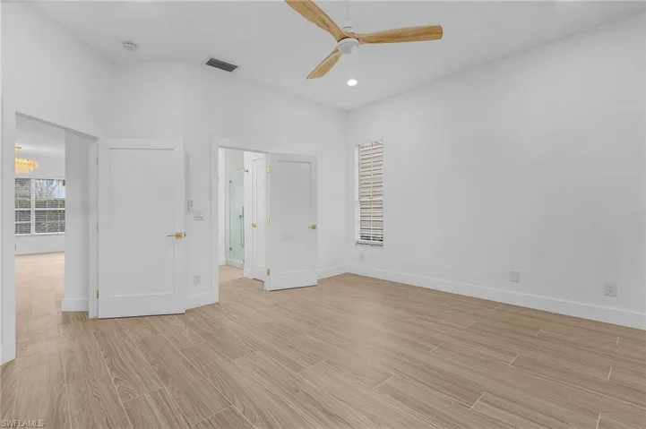Empty room featuring ceiling fan