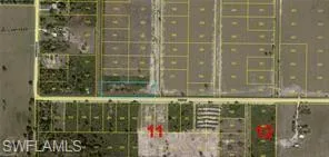 Aerial view of property's location with property parcel outlined