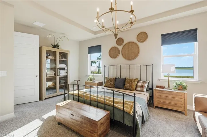 Recessed tray ceiling with a decorative chandelier