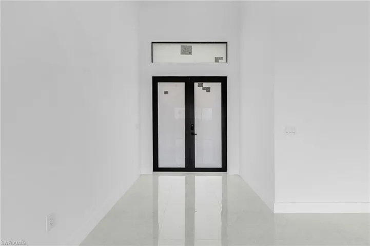 Doorway to outside featuring french doors