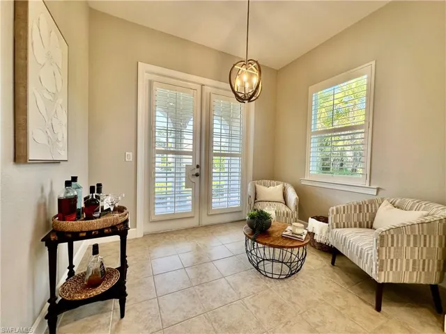 Flex room in kitchen with  French doors to patio out front