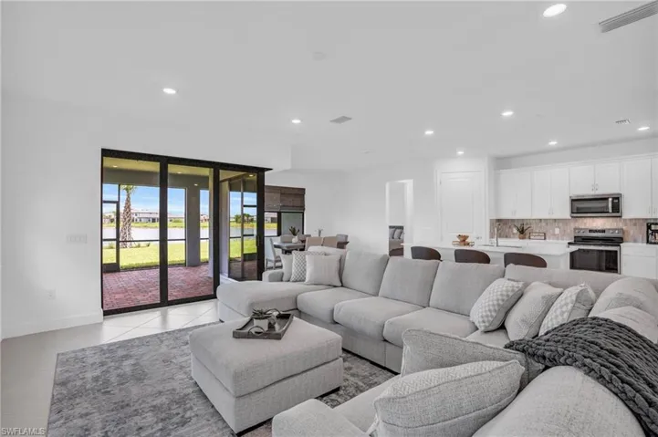Living room featuring light tile patterned floors