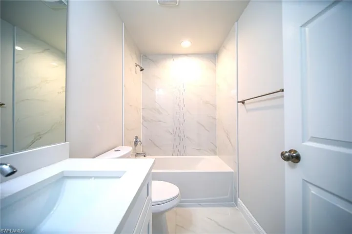 The Master Bathroom Has Granite Countertops And Custom Accent Tile Over The Tub Area!