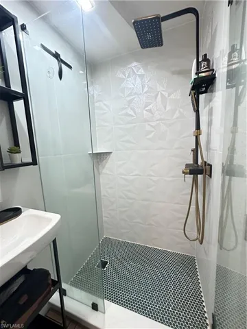Bathroom featuring a walk in shower
