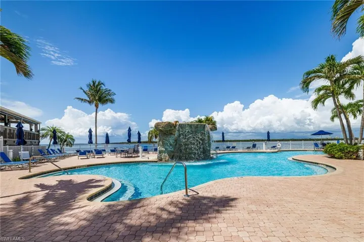 Community pool with a patio area