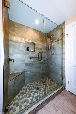 Bathroom with an enclosed shower