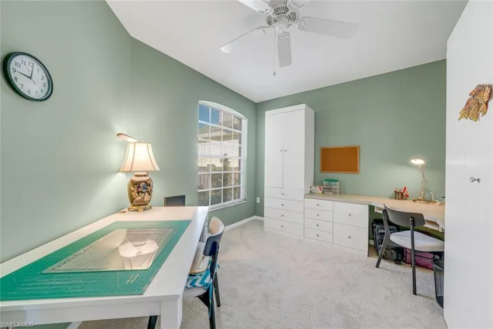 Den configured as an office/hobby rooim