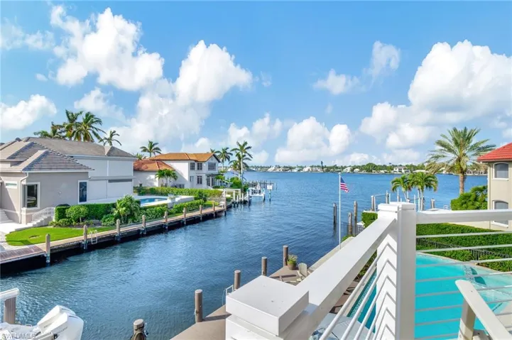 Upstairs balcony area featuring a water view of Naples Bay