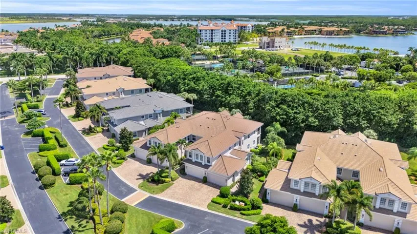 Aerial view of residential area with a nearby body of water