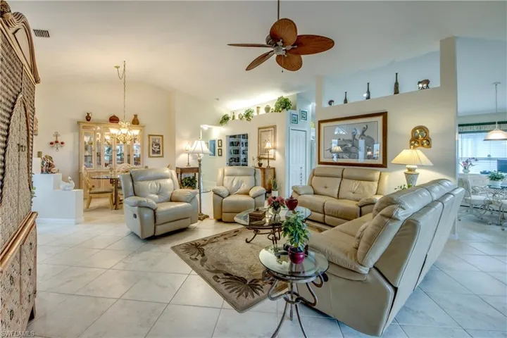 The same large porcelain tile runs thru out the home.  Looking to formal dining area.