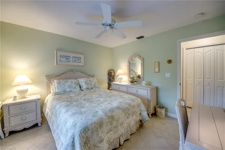 Bedroom has walk-in closet.  You can see the large linen closet outside the doorway also.