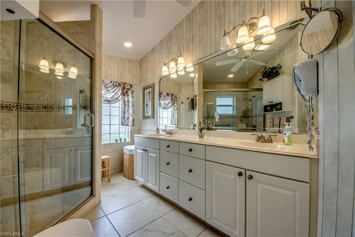 Re-modeled Master Bath with Large Shower and quartz counter-tops.