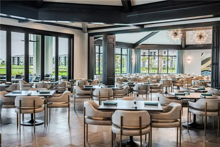 Community lobby featuring beamed ceiling, coffered ceiling, and crown molding