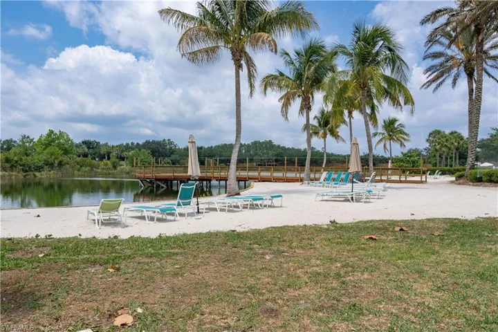 View of pool featuring a water view
