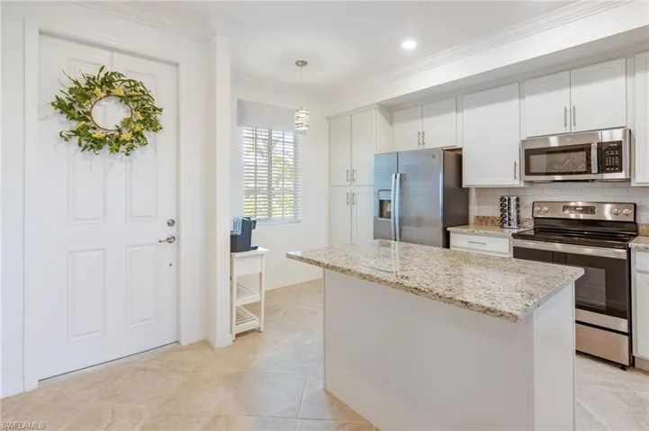 Granite counters, lots of cabinetry and a plenty of counter space.