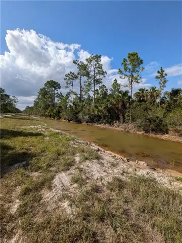 View of yard featuring a water view