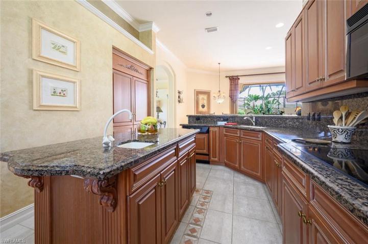 Galley Style Kitchen with Large Island, Prep Sink and Cabinet refrigerator