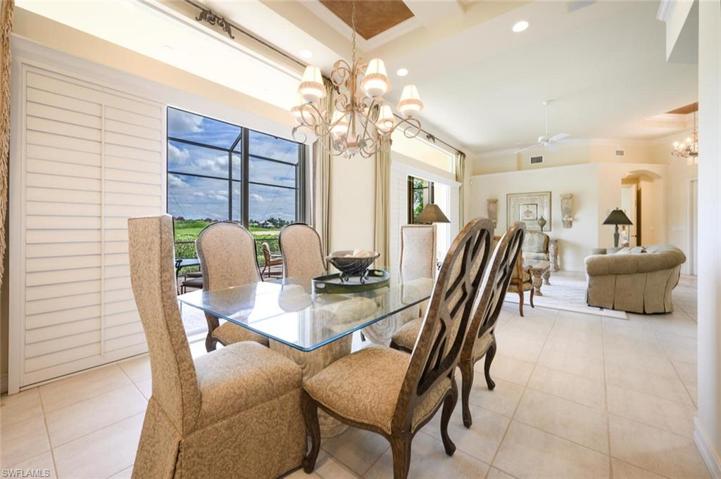 Open Concept formal dining and living rooms with back lanai access perfect for entertaining