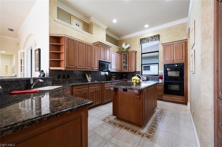 Well designed kitchen with built in double ovens
