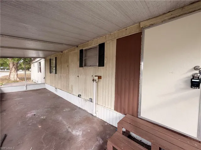 View of patio / terrace with an attached carport
