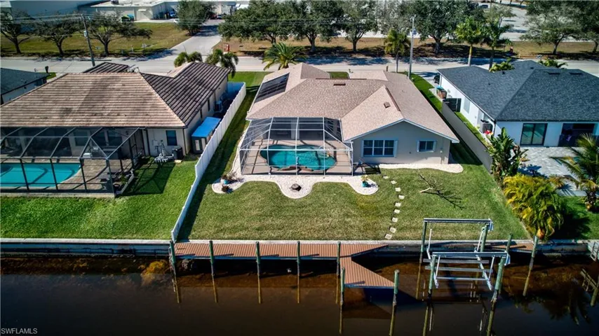 Aerial view of residential area with a pool area
