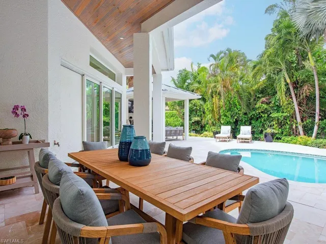 Covered patio featuring a wood-finish ceiling