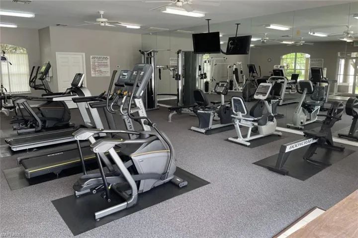 Gym featuring ceiling fan