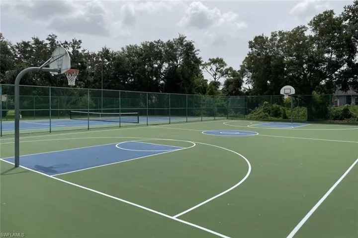 View of sport court with community basketball court and a tennis court