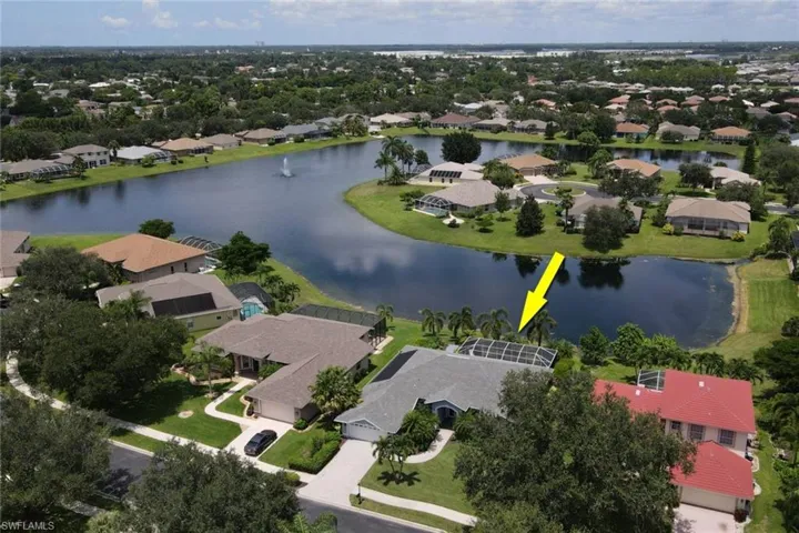 Aerial view of residential area with a nearby body of water