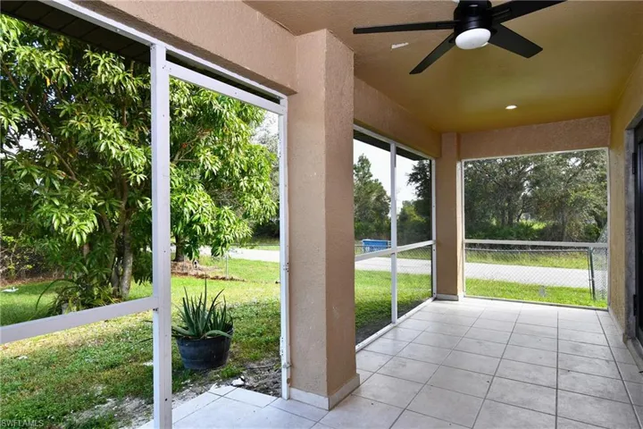 View of patio with a ceiling fan