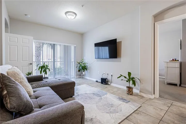 Living room with light colored carpet