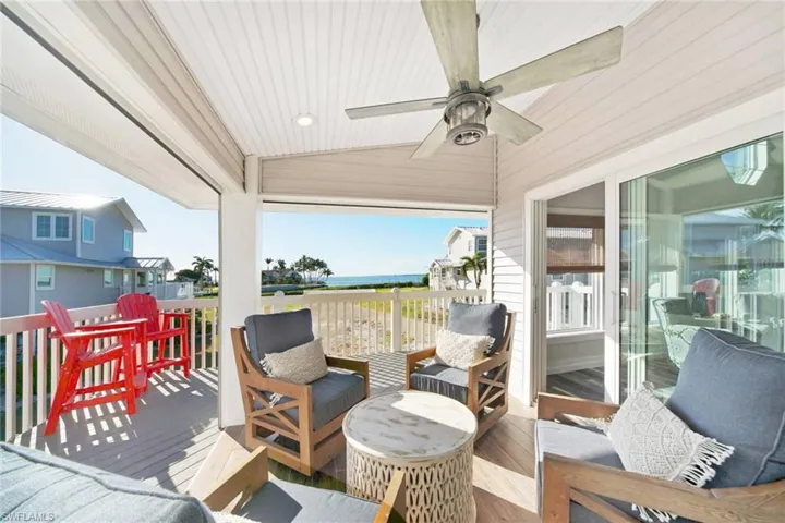 Wooden deck with a ceiling fan