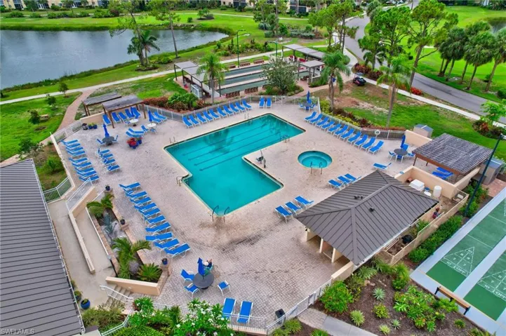 Aerial view of a large body of water and a pool area