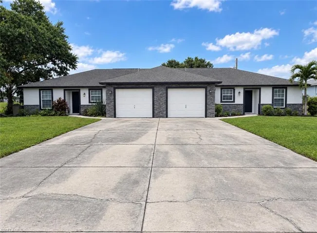 704 / 706 Gretchen Ave S, Lehigh Acres, Florida 33973