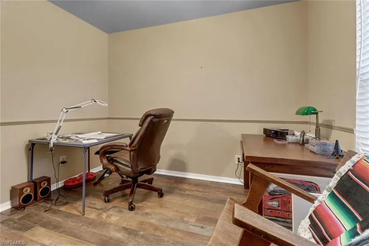 Office space featuring hardwood / wood-style flooring