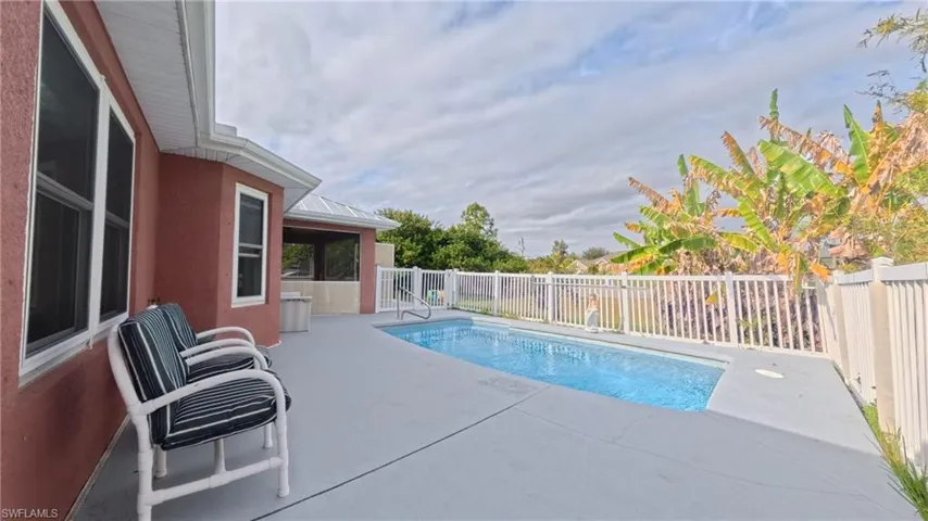 View of fenced swimming pool