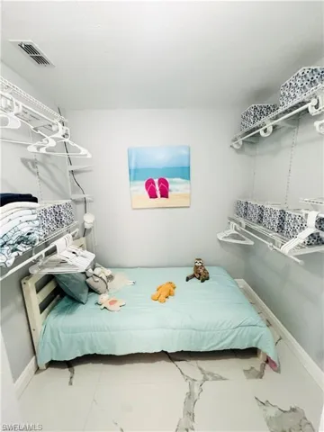 Bedroom with baseboards