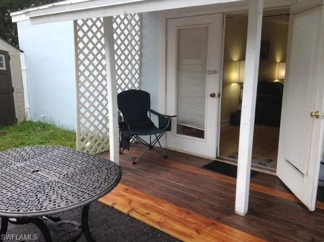 Deck leading into 1 bedroom attached apt