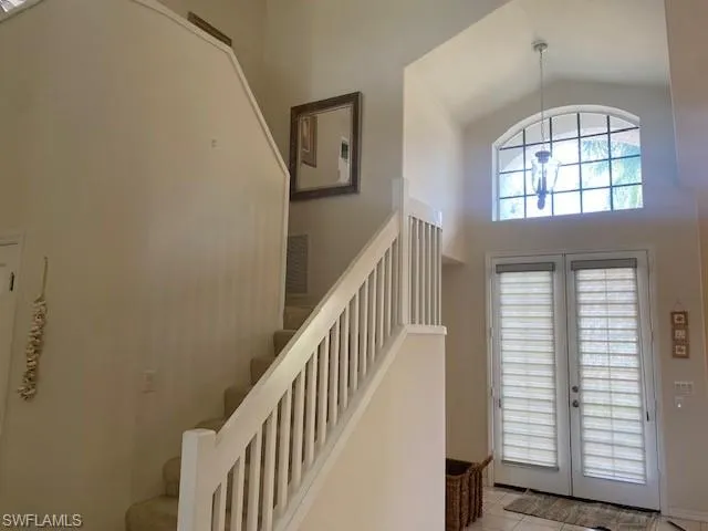 Entry with steps to the loft and bedroom