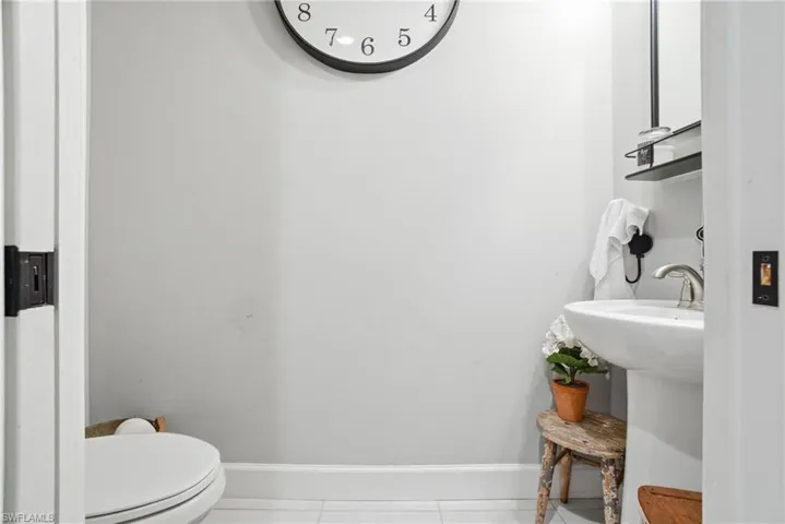 Bathroom featuring tile patterned flooring and baseboards