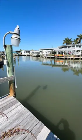 Dock featuring a water view