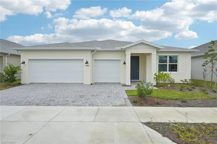 Ranch-style house featuring a garage
