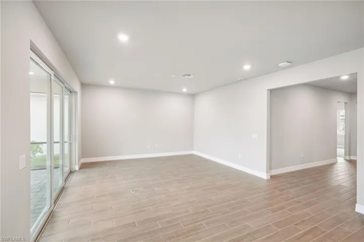 Empty room featuring light wood-type flooring