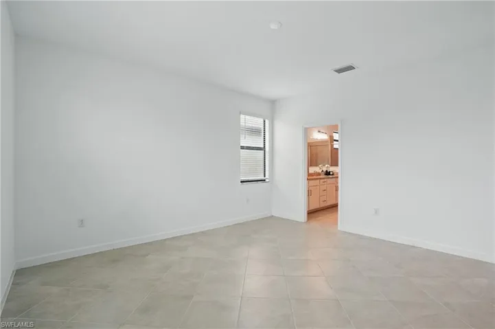 Empty room with baseboards